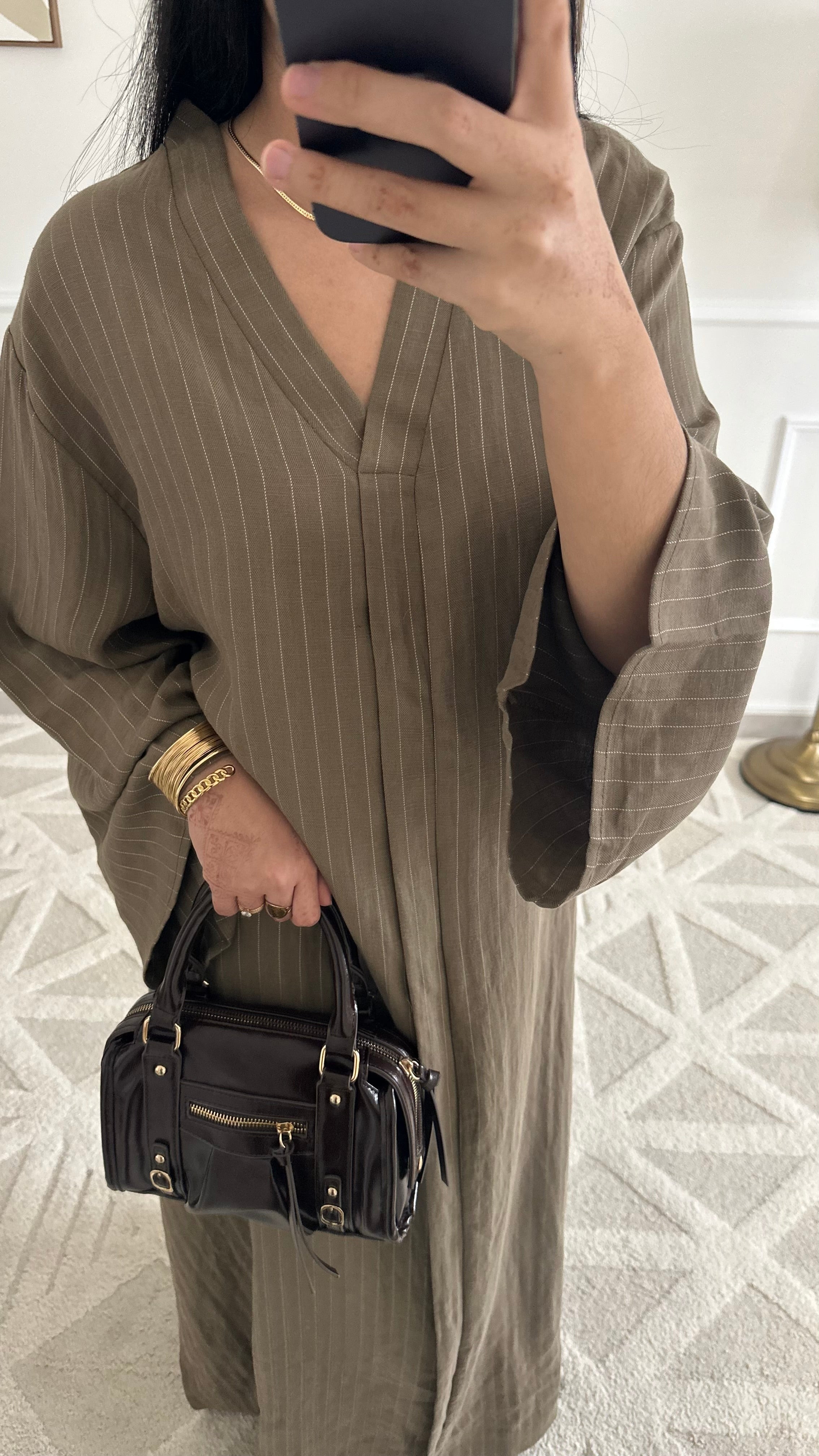 Robe longue et fluide en lin à rayures et ceinture |
Kaki