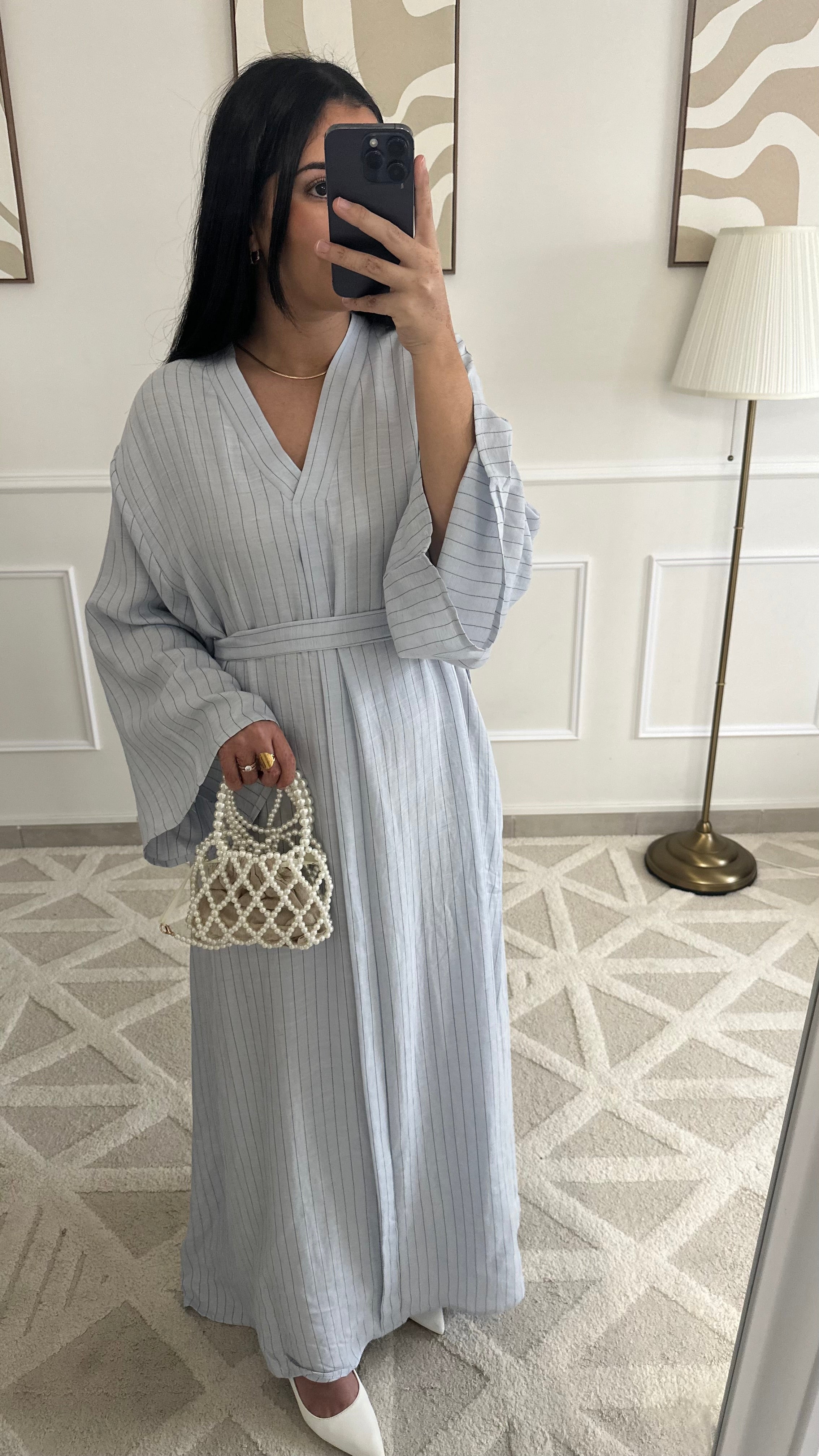 Robe longue et fluide en lin à rayures et ceinture |
Bleue ciel