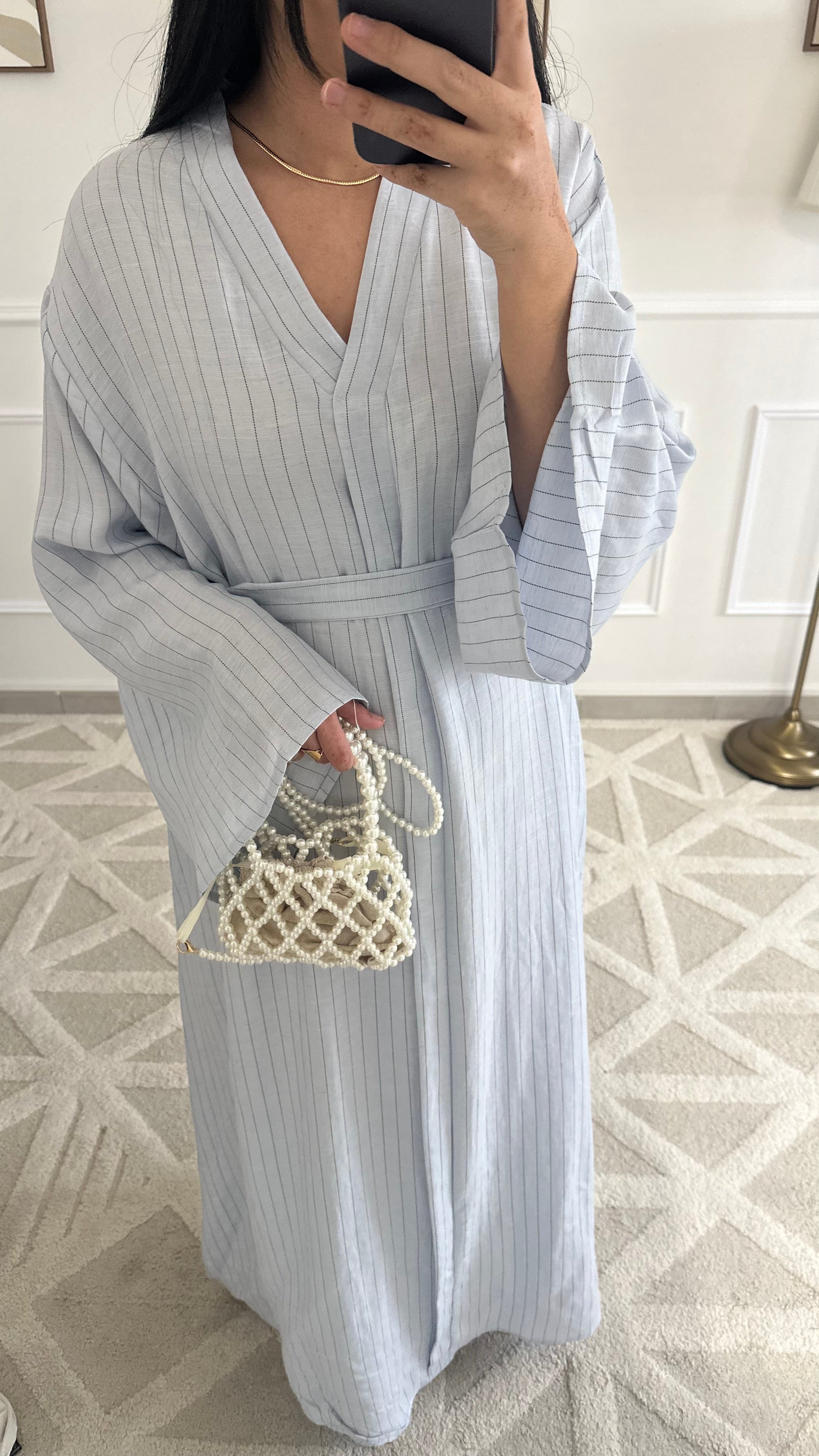 Robe longue et fluide en lin à rayures et ceinture |
Bleue ciel