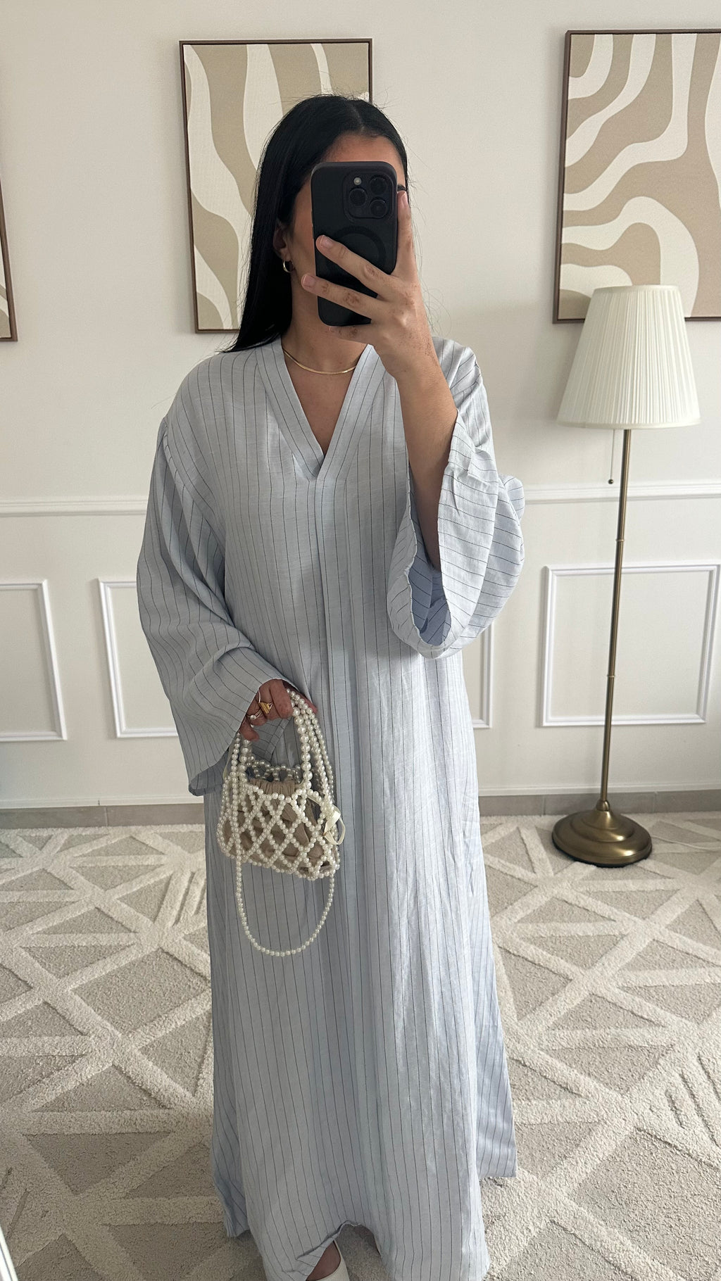 Robe longue et fluide en lin à rayures et ceinture |
Bleue ciel