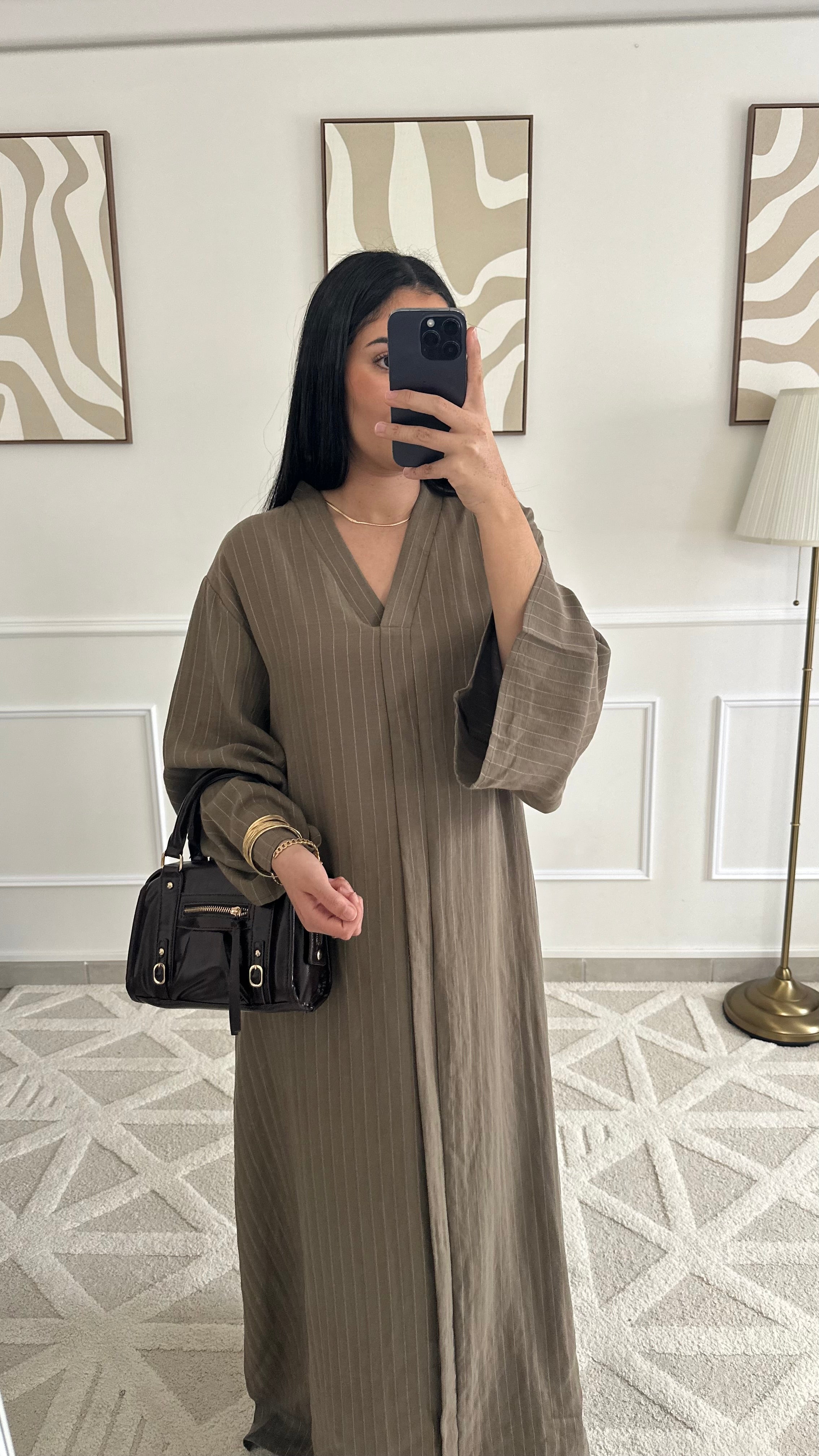 Robe longue et fluide en lin à rayures et ceinture |
Kaki