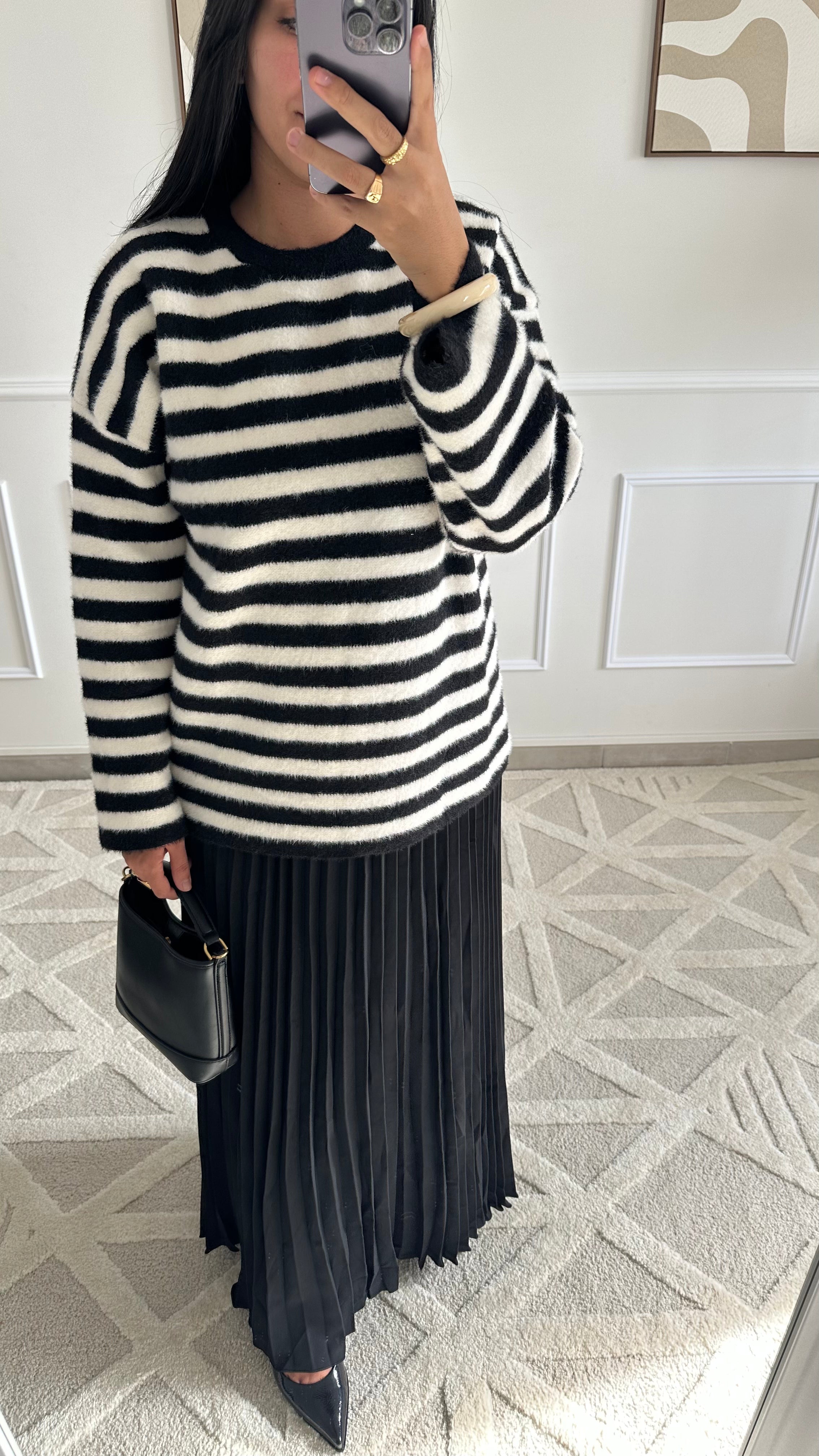 Pull doux à motif rayé noir et blanc